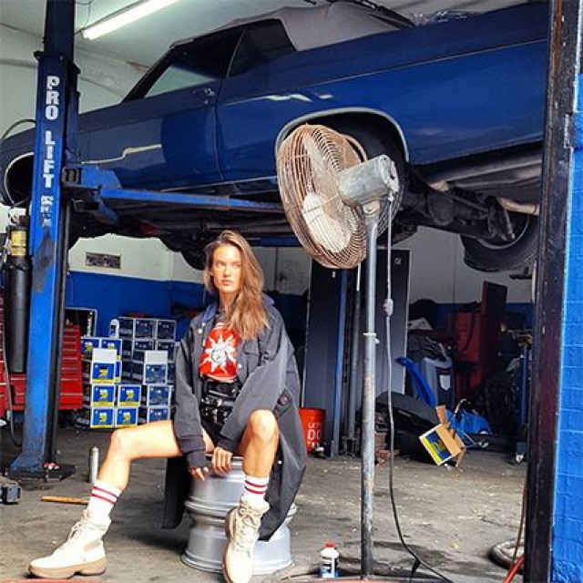 Alessandra Ambrosio became queen of a car repair centre
