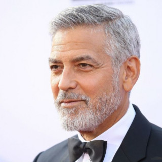 George Clooney turns up behind Meghan Markle
