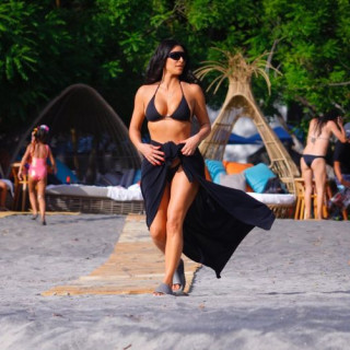 Kim Kardashian in a swimsuit hit the lenses of the paparazzi