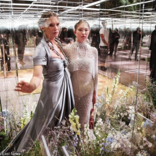 Kate Moss on the catwalk with daughter Leela